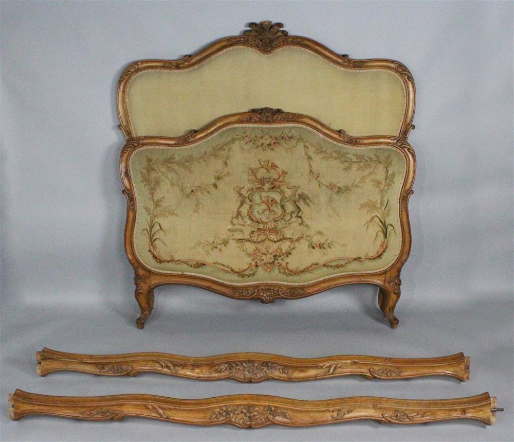 Appraisal: LOUIS XV STYLE CARVED FRUITWOOD BEDSTEAD th Century the arched