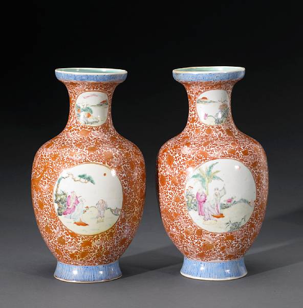 Appraisal: A pair of famille rose enameled baluster vases with circular