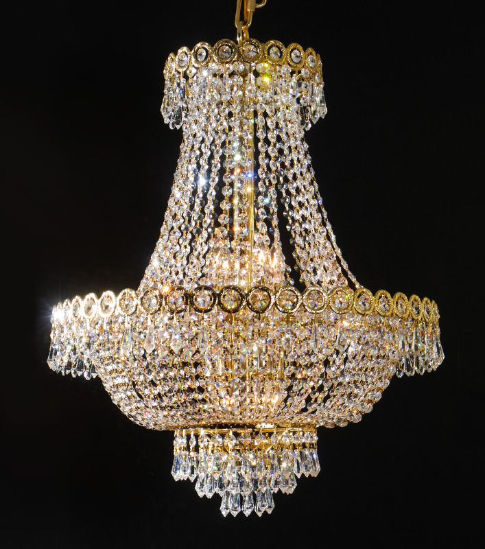 Appraisal: SWAROVSKI CRYSTAL LIGHT BRASS CHANDELIER Brass frame with crystal prisms