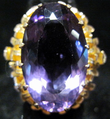 Appraisal: karat gold amethyst ring Oval cut and prong set