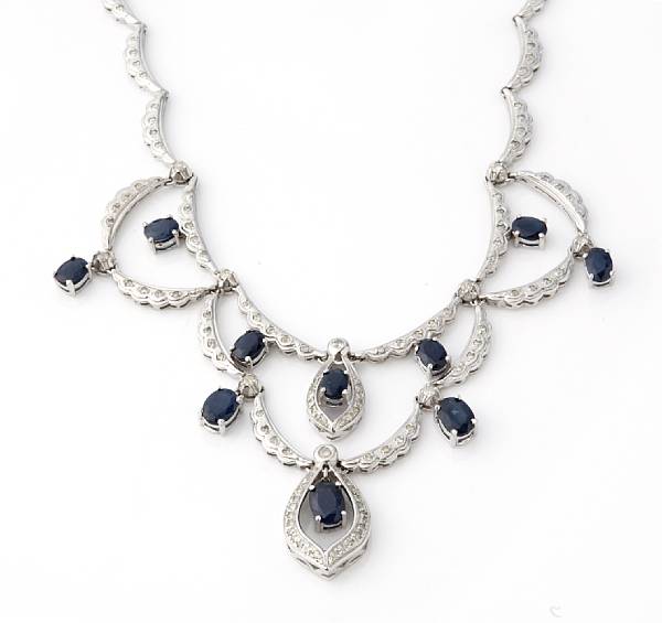 Appraisal: A sapphire diamond and k white gold fringe necklace