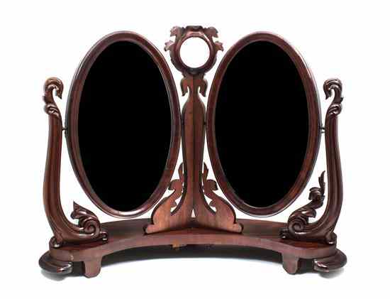 Appraisal: A Victorian Mahogany Dual Dressing Mirror the two oval swivel