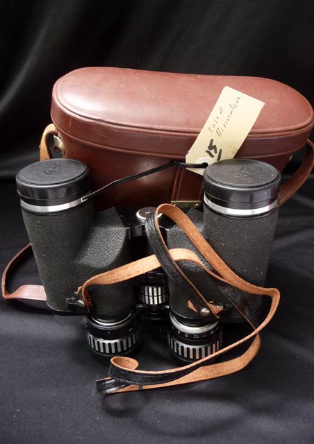 Appraisal: A pair of Tasco x x binoculars extra wide angle