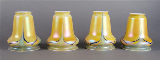 Appraisal: A Set of Four Iridescent Glass Shades Quezal or Steuben