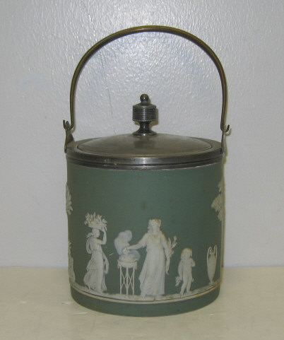 Appraisal: WEDGWOOD JASPERWARE BISCUIT BARREL Cylindrical green dip with white figural