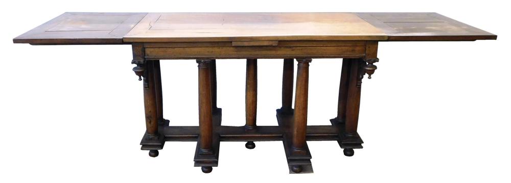 Appraisal: Walnut oblong extension tip table Continental probably French in the