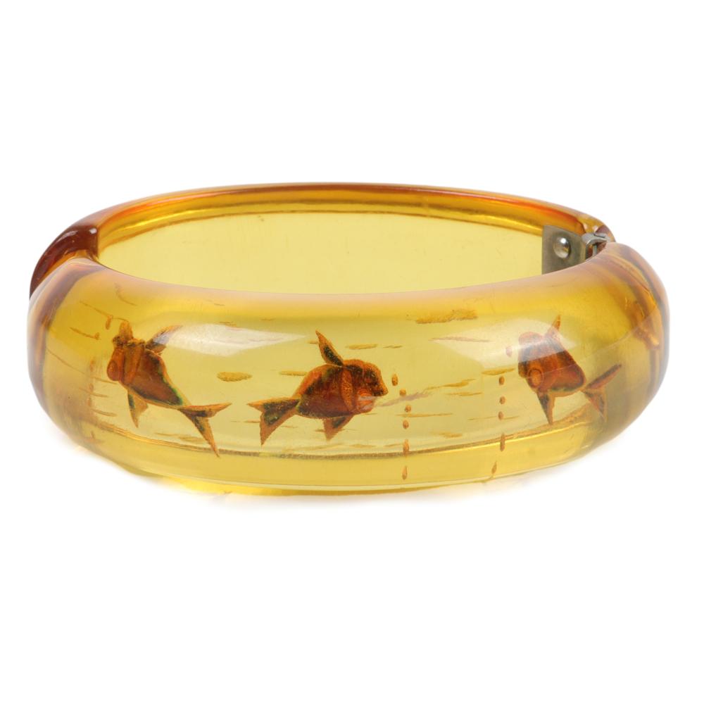 Appraisal: BAKELITE REVERSE CARVED AND PAINTED GOLDFISH APPLE JUICE CLAMPER BRACELET