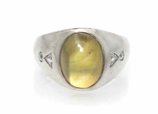 Appraisal: A Karat Yellow Gold Cat's Eye Chrysoberyl and Diamond Ring