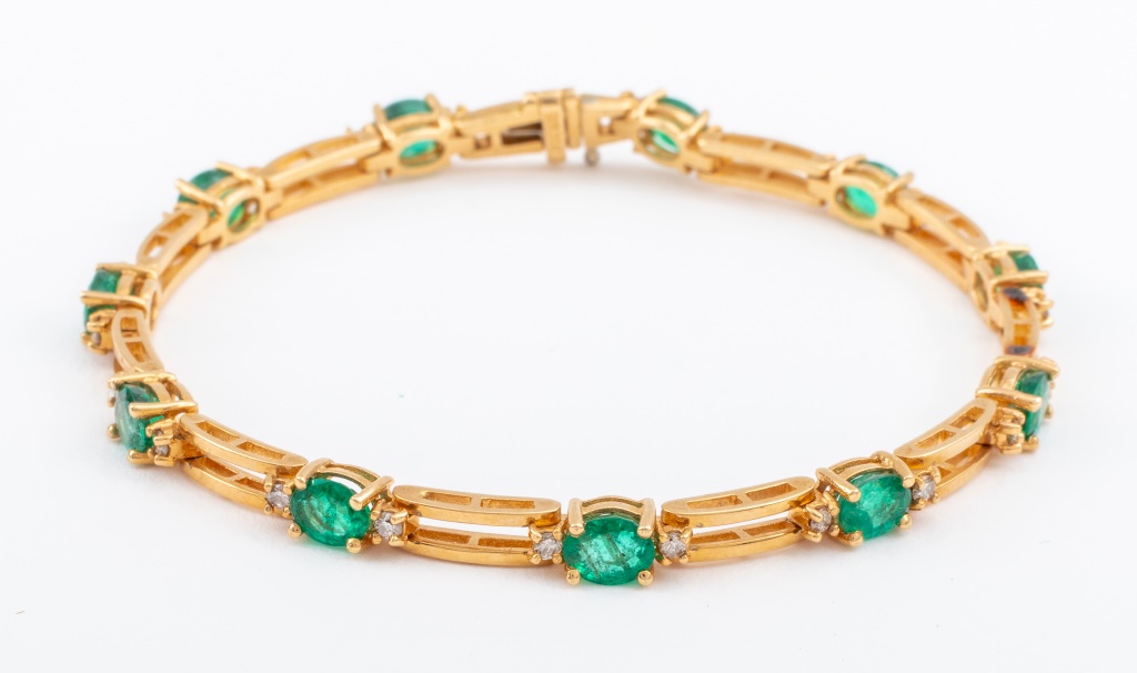 Appraisal: K YELLOW GOLD EMERALD DIAMOND BRACELET Designed as a K