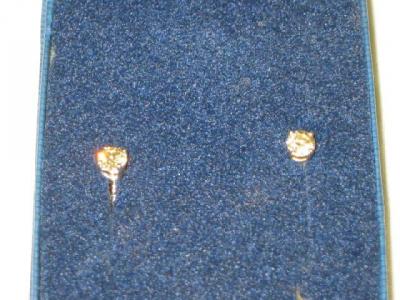 Appraisal: A PAIR OF DIAMOND STUD EARRINGS mounted in white gold