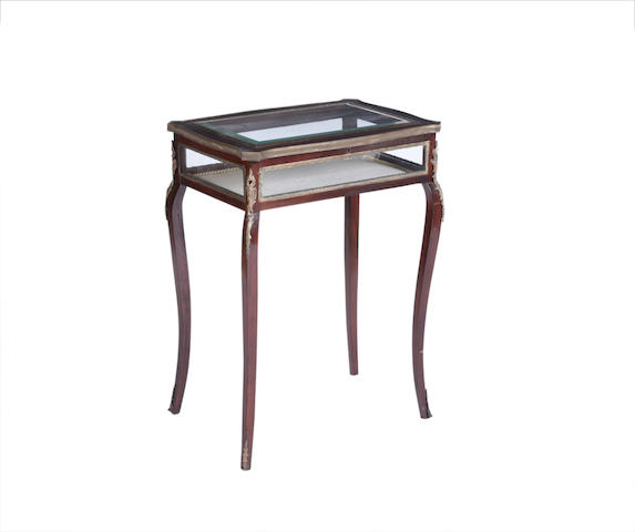 Appraisal: An edwardian Mahogany and brass mounted bijoutierie table in the