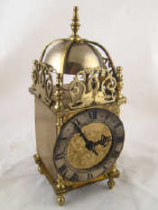 Appraisal: A mantel clock in the form of a th c