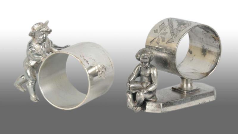 Appraisal: Lot of Figural Napkin Rings Description Includes young boy wearing