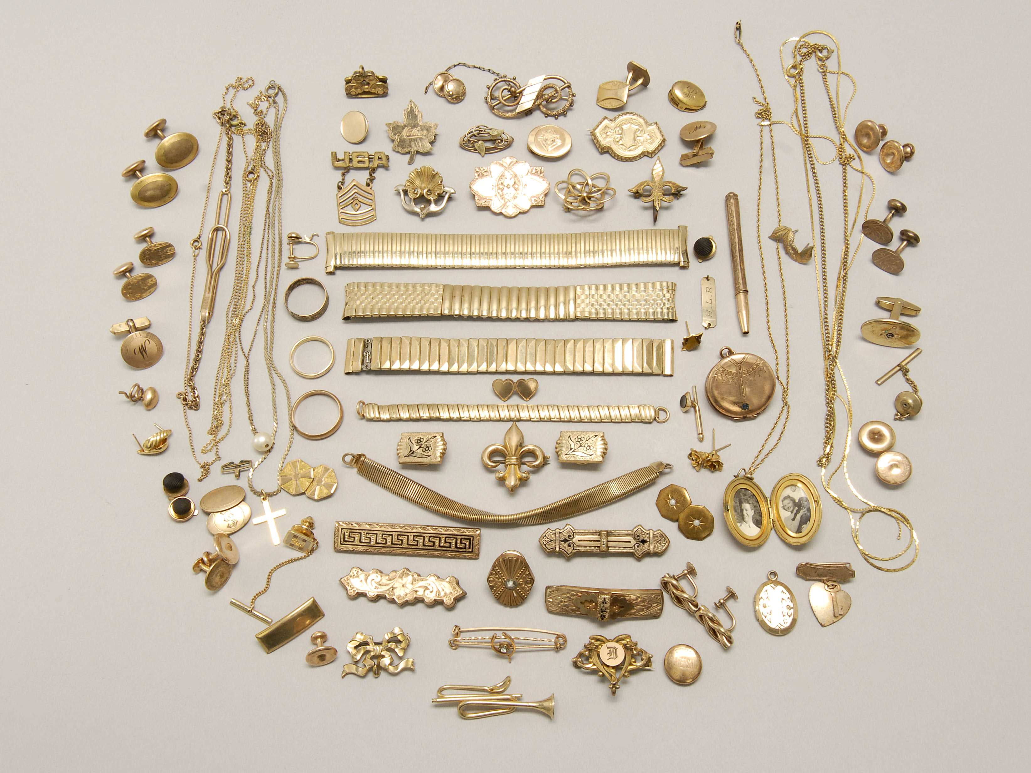 Appraisal: ASSORTED GOLD-FILLED JEWELRY Includes a variety of pins watchbands cuff