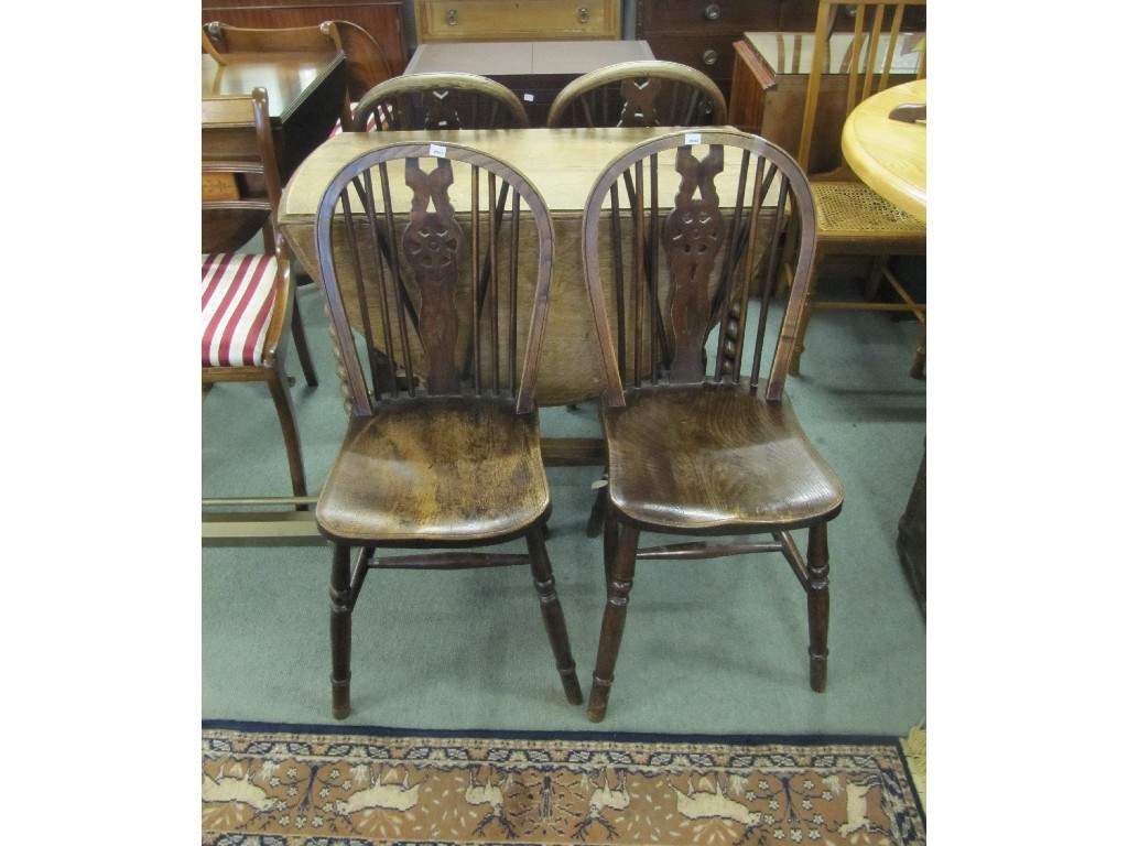 Appraisal: Oak gateleg dining table with four spindle back chairs