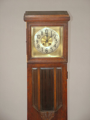 Appraisal: An oak longcase clock circa the stepped and reeded hood