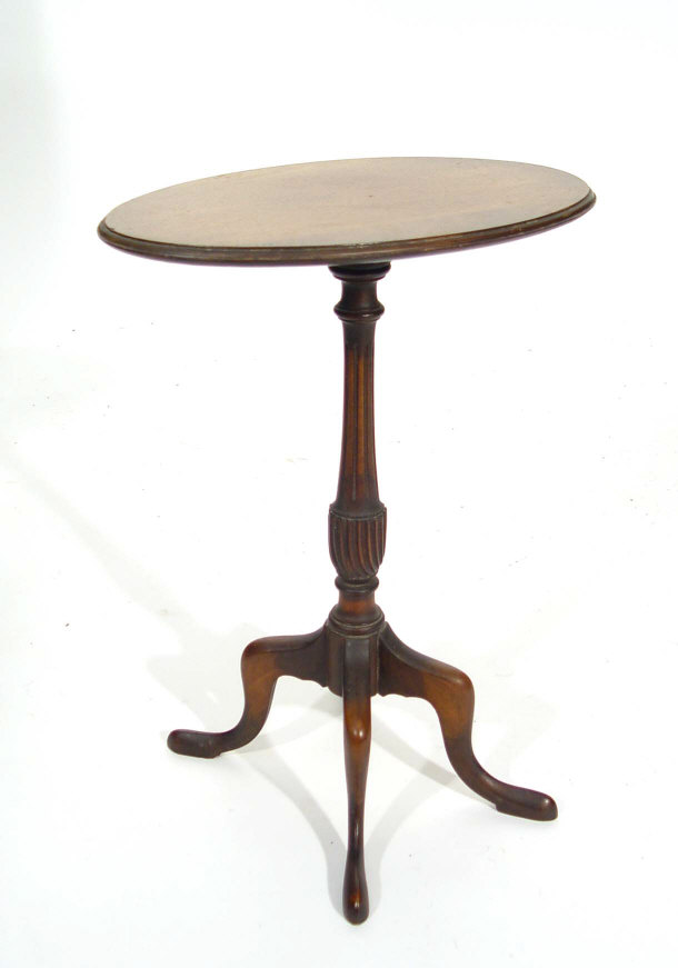 Appraisal: Oval mahogany tripod wine table on reeded pedestal and cabriole