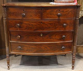 Appraisal: Empire flame mahogany chest circa the five drawer case flanked