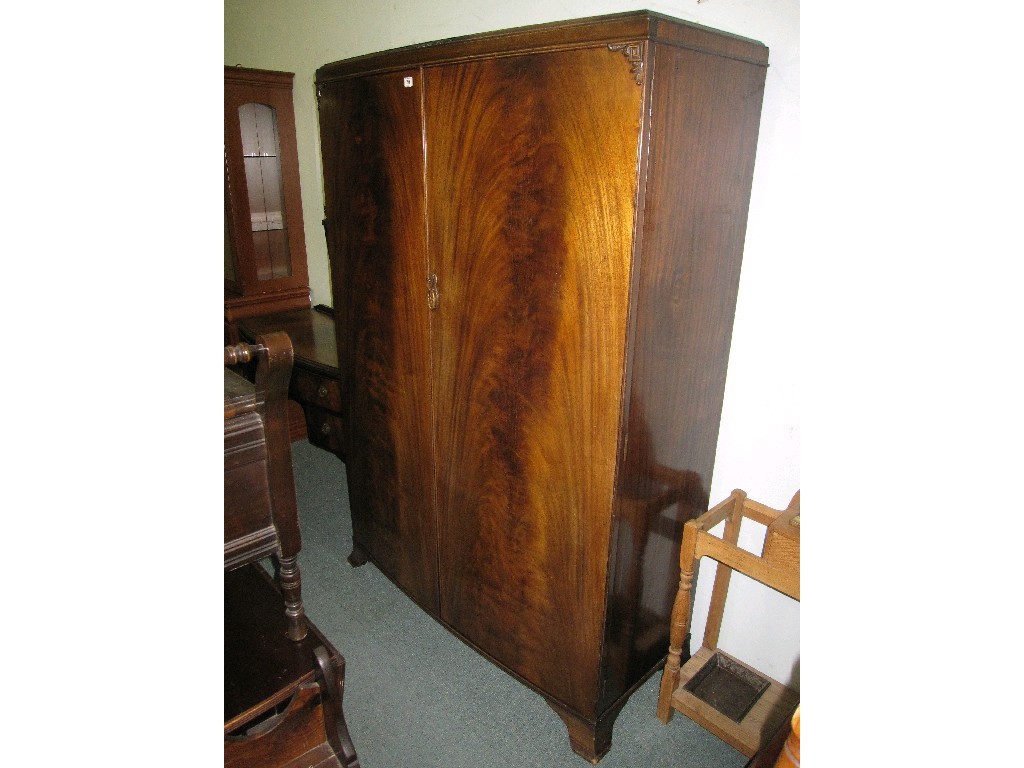 Appraisal: Mahogany bow fronted wardrobe with dressing table