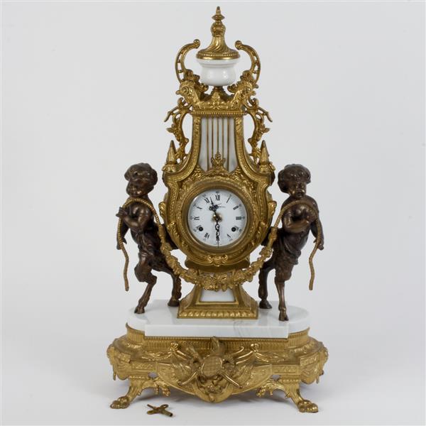 Appraisal: Italian gilt metal and porcelain mantle clock in the form