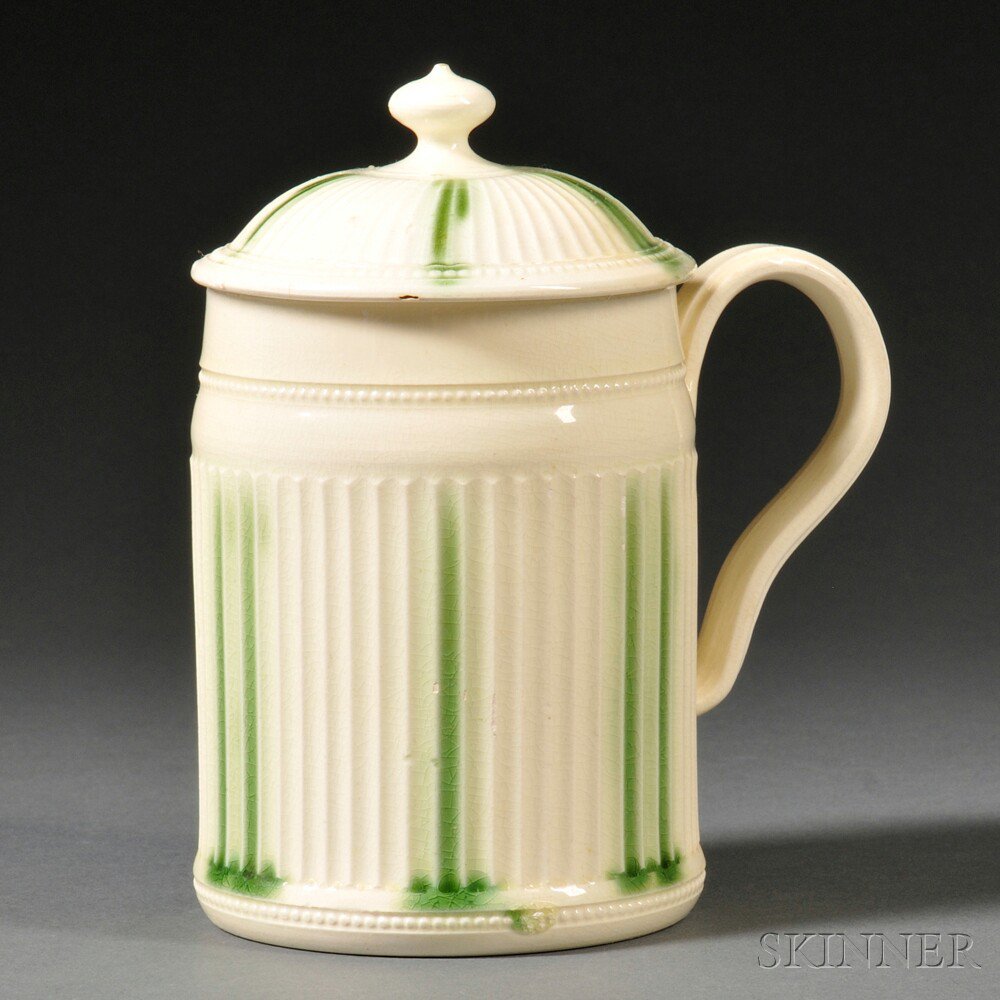 Appraisal: Leeds Cream-colored Earthenware Tankard and Cover England c cylindrical shape