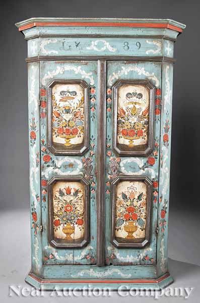 Appraisal: A German Paint-Decorated Shrank with deep molded cornice and frieze