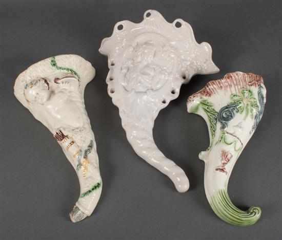 Appraisal: Two Staffordshire creamware wall pockets and similar white salt glazed