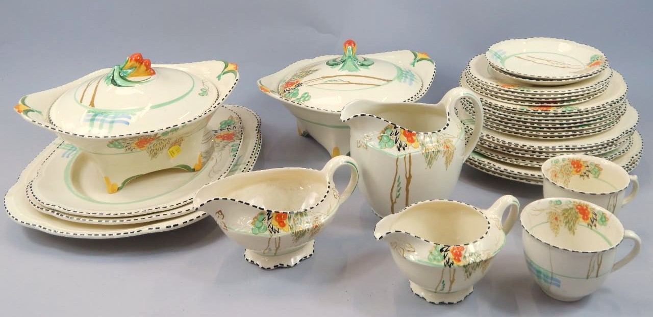 Appraisal: A Woods ivory ware handcraft pattern part dinner service comprising