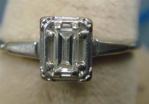 Appraisal: K WG diamond ring marked Siffari emerald cut diamond about