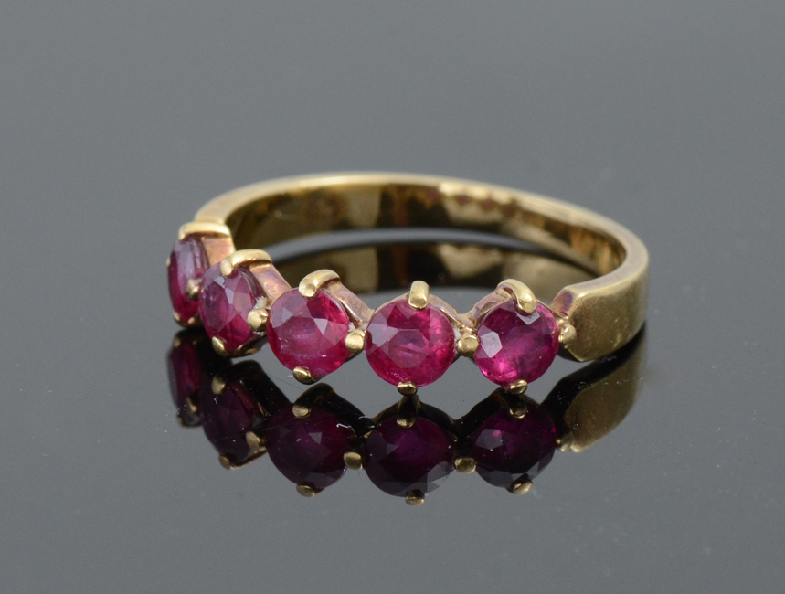 Appraisal: K RUBY WEDDING BAND K yellow gold ring contains round