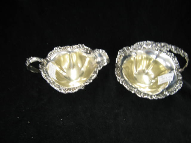 Appraisal: Victorian Sterling Silver Creamer Sugar Basket floral border footed gold