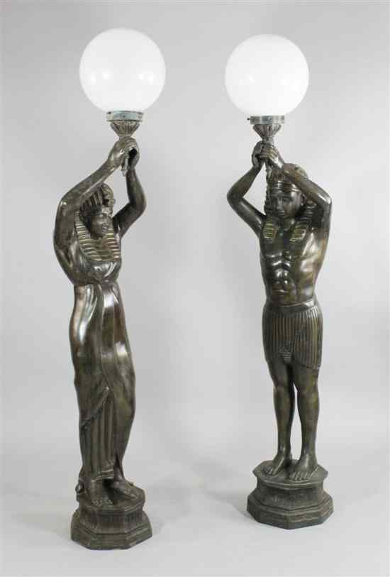 Appraisal: A large pair of Art Deco style bronze Egyptian figural