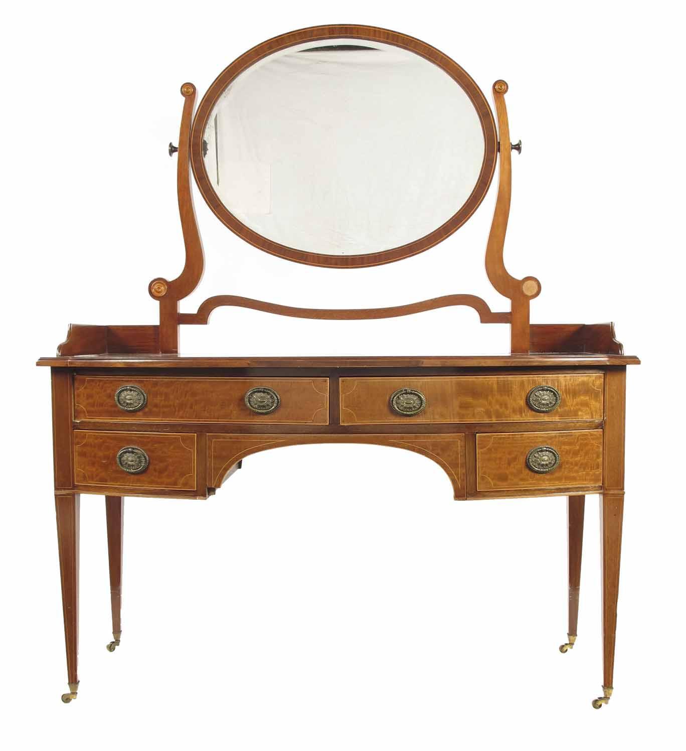 Appraisal: A late Victorian mahogany breakfront dressing table