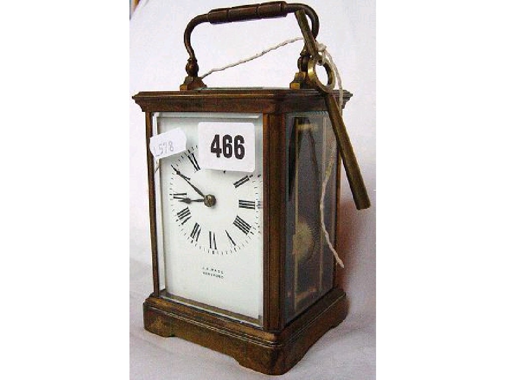 Appraisal: A th century brass carriage clock with enamel dial loop