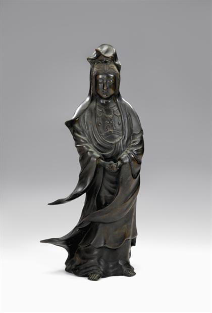 Appraisal: Good and large Chinese bronze Quanyin model th century Robustly