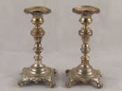 Appraisal: A pair of Brazilian candlesticks the shaped square bases on