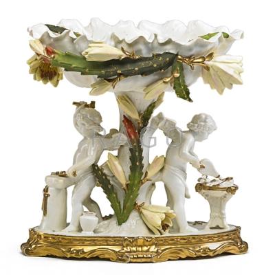 Appraisal: MOORE BROTHERS PORCELAIN COMPOTE Cherubs working as blacksmiths beneath foliate