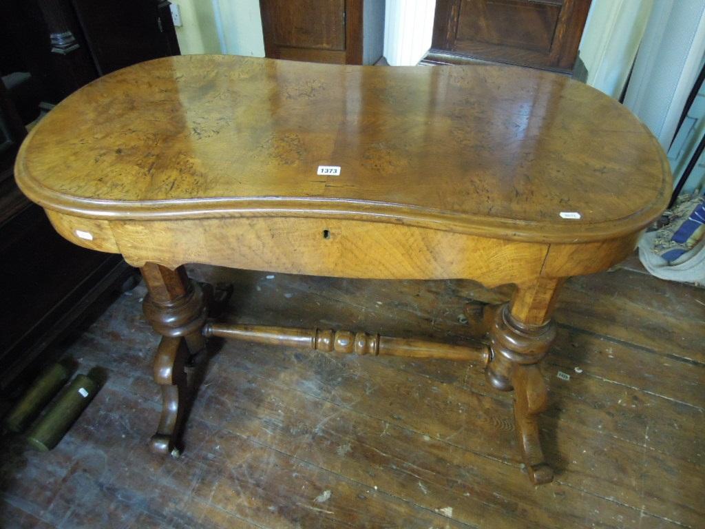 Appraisal: A Victorian pollard oak centre table of kidney shaped form