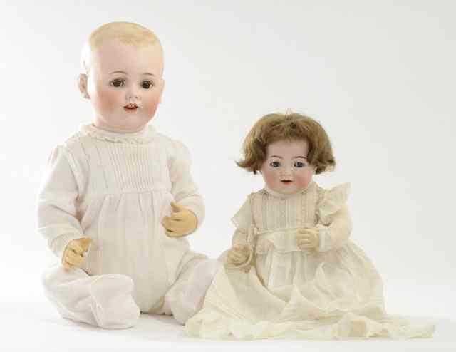 Appraisal: TWO COLLECTIBLE GERMAN BISQUE SOCKET HEAD DOLLS Kammer and Reinhardt