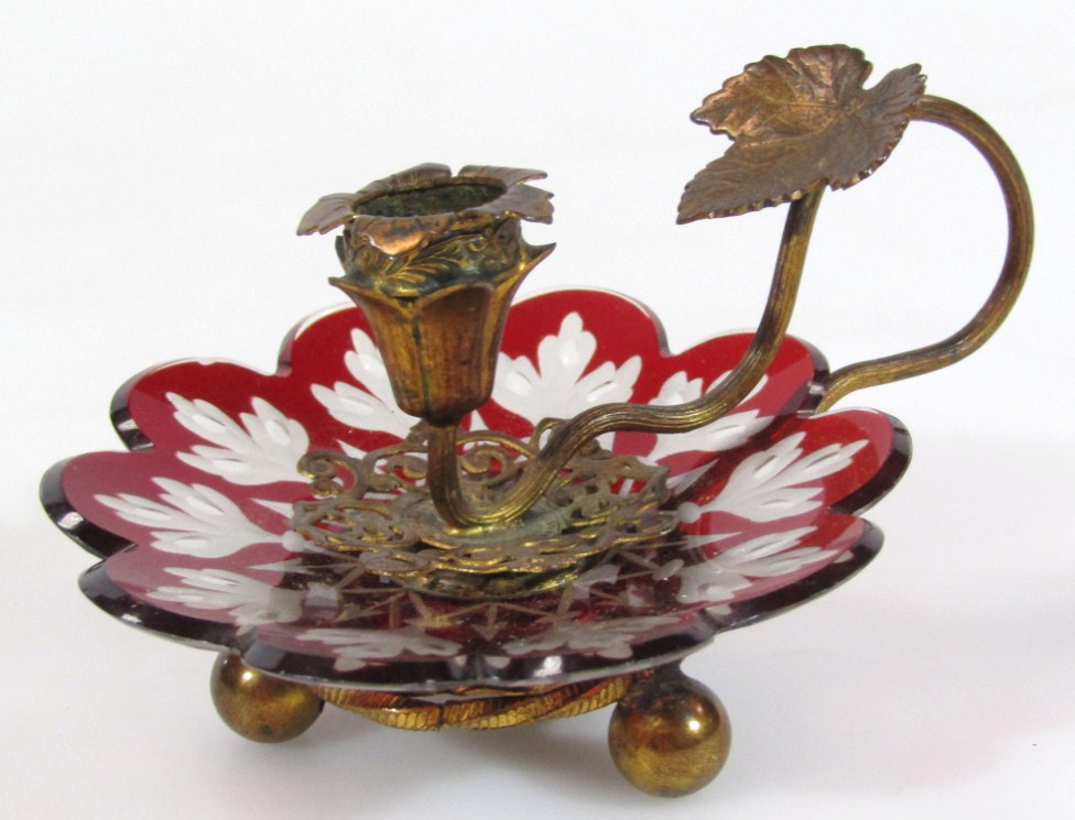 Appraisal: An early thC ruby and frosted glass gilt metal candlestick