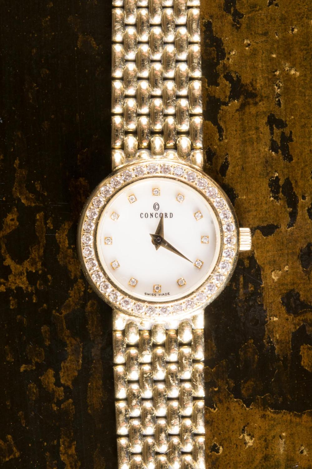 Appraisal: LADY'S DIAMOND AND EIGHTEEN KARAT GOLD WRIST WATCH Concord Watch