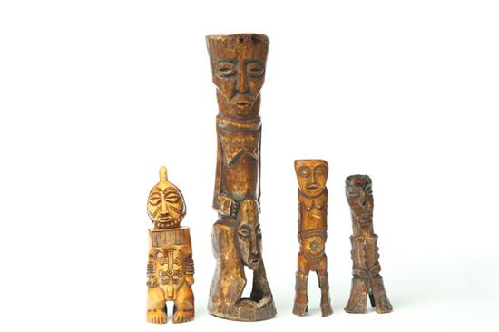 Appraisal: FOUR IVORY AND BONE CARVINGS Africa st half- th century