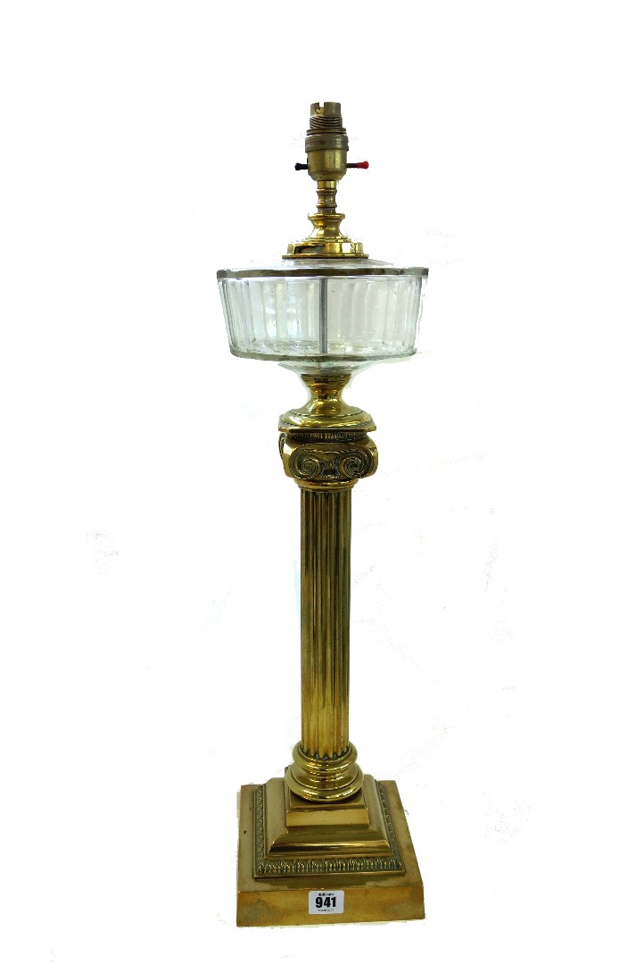 Appraisal: A Victorian brass oil lamp converted to a table lamp