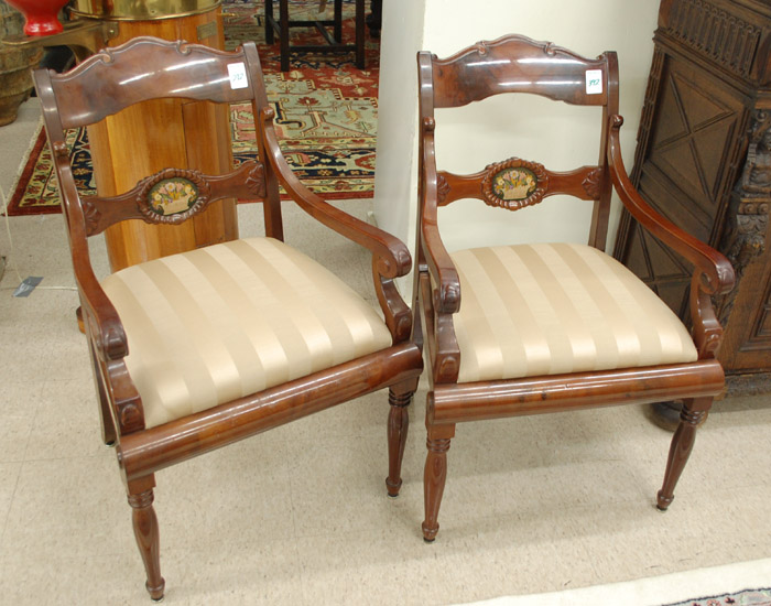 Appraisal: A PAIR OF EMPIRE STYLE MAHOGANY ARMCHAIRS American th century