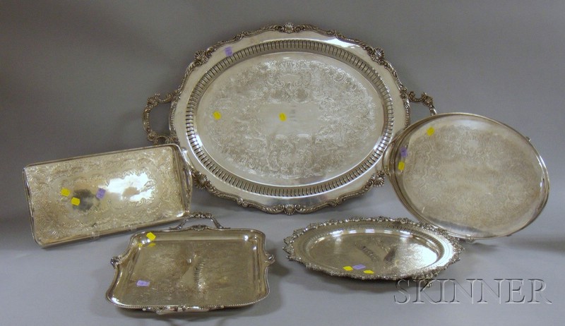 Appraisal: Five Silver Plated Serving Trays a large oval open-sided tray