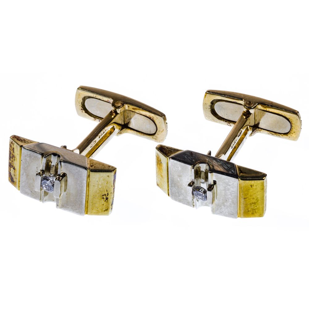 Appraisal: K BI-COLOR GOLD AND DIAMOND CUFFLINKSPair having articulated stem round