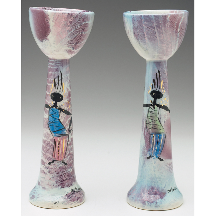 Appraisal: Marc Bellaire Balinese candlesticks pair colorfully painted figures against a