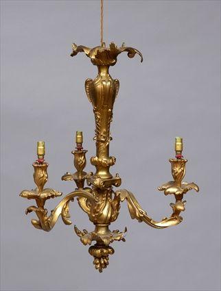 Appraisal: LOUIS XV-STYLE GILT-BRONZE THREE-LIGHT CHANDELIER The central stem with spiral