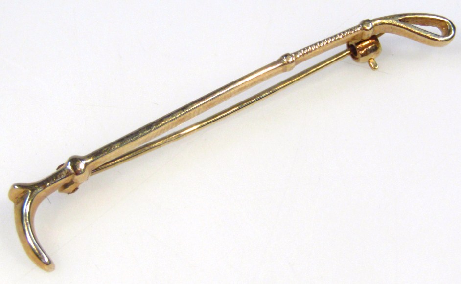 Appraisal: A ct gold tie pin brooch in the form of