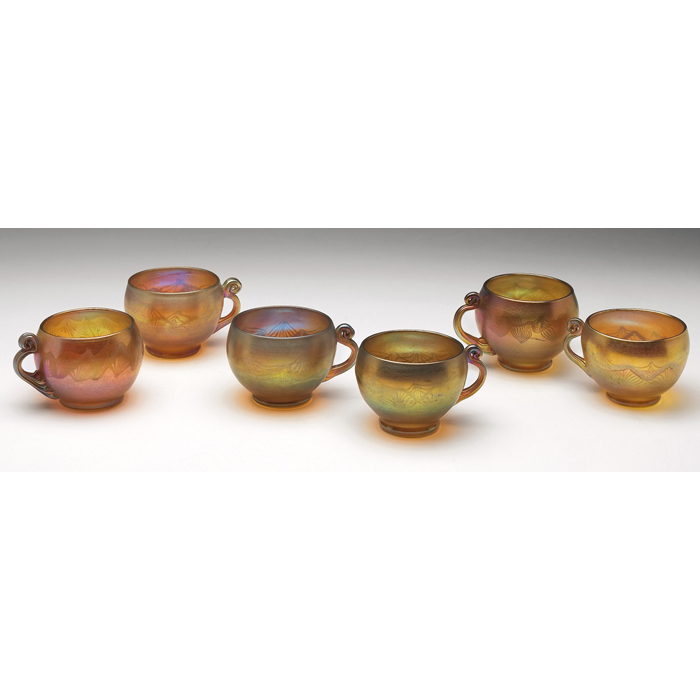 Appraisal: L C Tiffany teacups set of six gold favrile glass